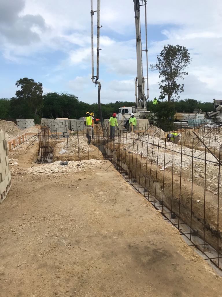 Site update: Pouring of the concrete for the building footing 2 of 3