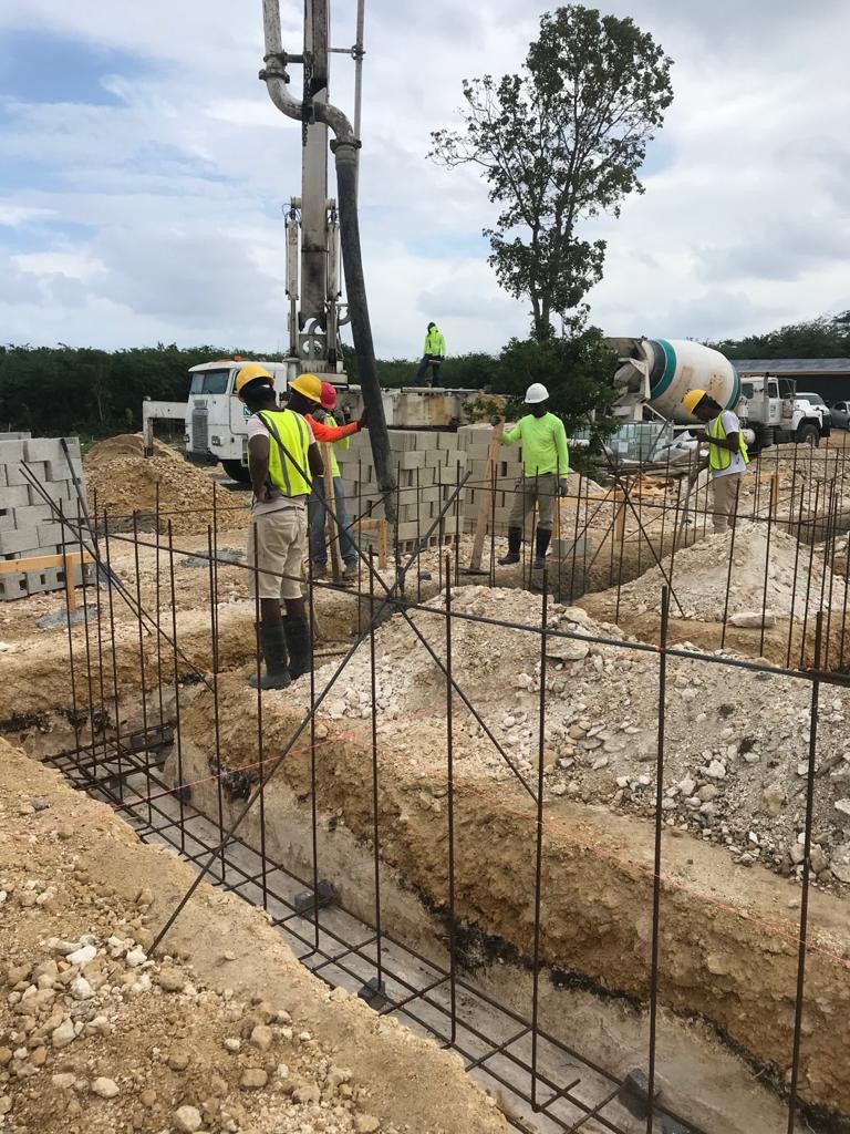 Site update: Pouring of the concrete for the building footing 1 of 3