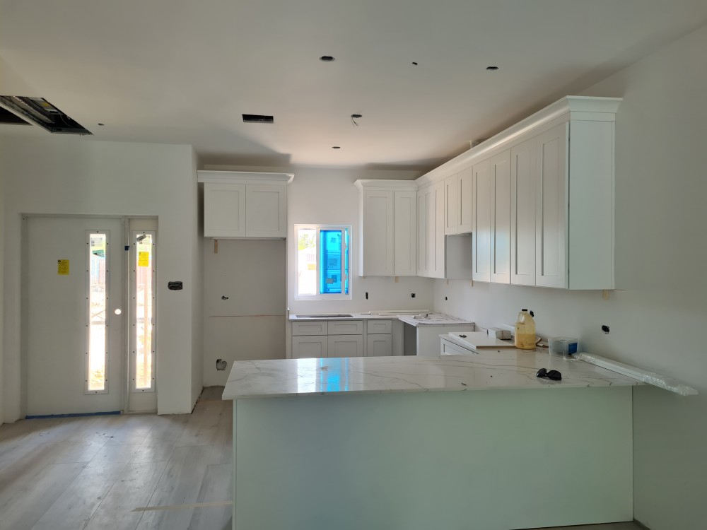 (I)  Townhomes : Quart Countertops installed. Cabinet Doors Installed!