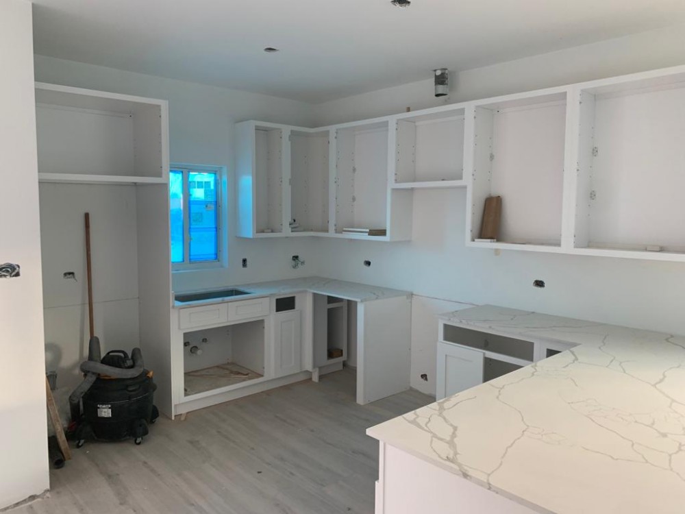 (H) 3 Bedroom Townhomes- Installing Cabinets